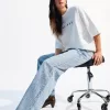 90-tals strassjeans med vida ben 90-tals strassjeans med vida ben