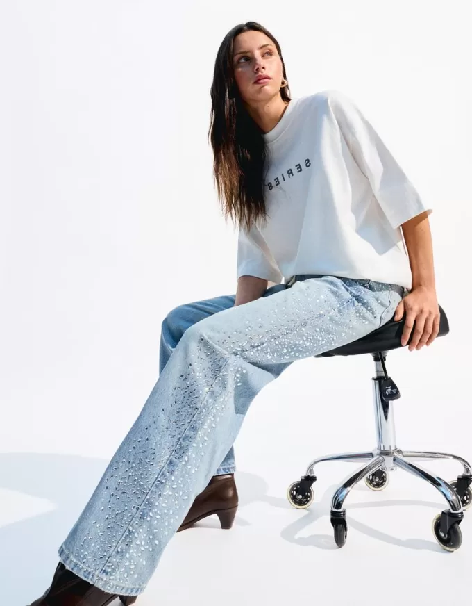 90-tals strassjeans med vida ben 90-tals strassjeans med vida ben