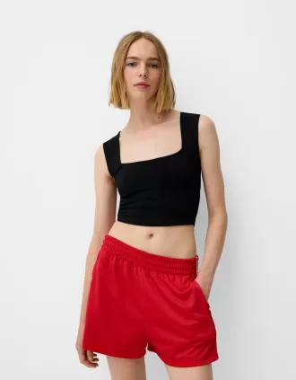 Ärmlös T-shirt med fyrkantig halsringning