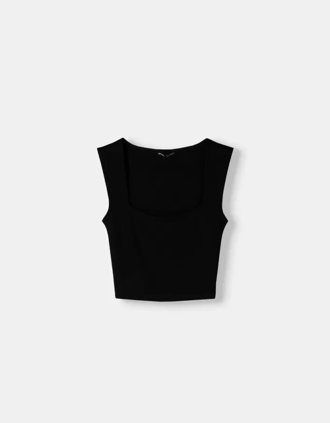 Ärmlös T-shirt med fyrkantig halsringning Ärmlös T-shirt med fyrkantig halsringning