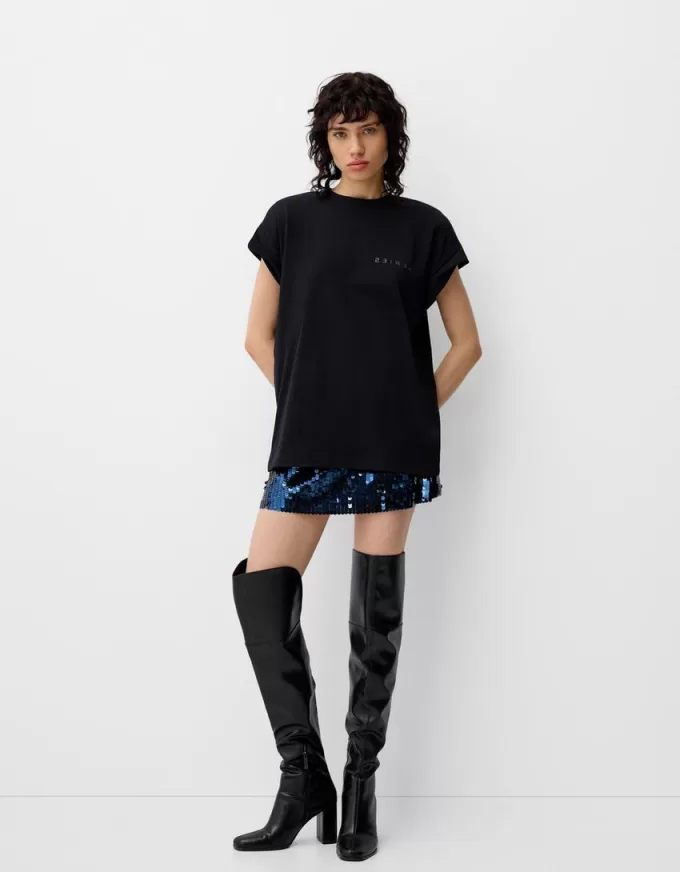 Ärmlös T-shirt med tryck Ärmlös T-shirt med tryck