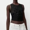 Ärmlös t-shirt i strass i tyll Ärmlös t-shirt i strass i tyll