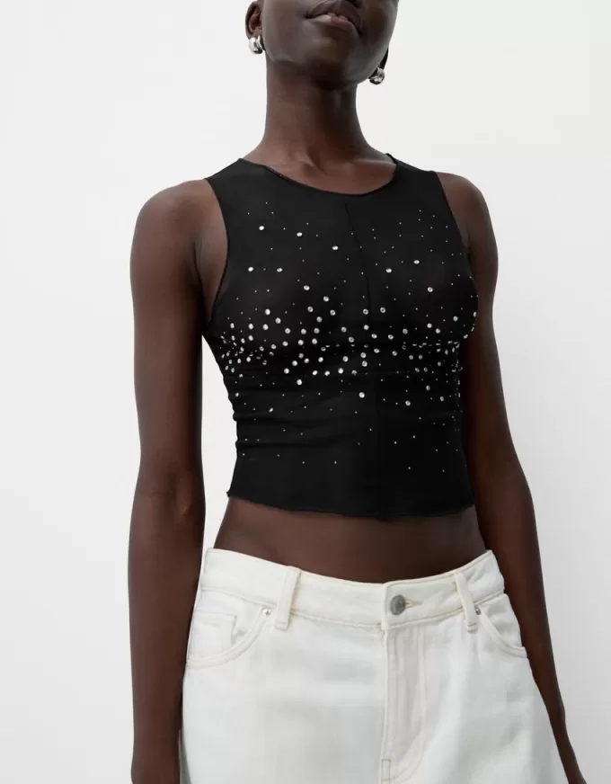Ärmlös t-shirt i strass i tyll Ärmlös t-shirt i strass i tyll