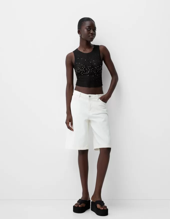 Ärmlös t-shirt i strass i tyll Ärmlös t-shirt i strass i tyll