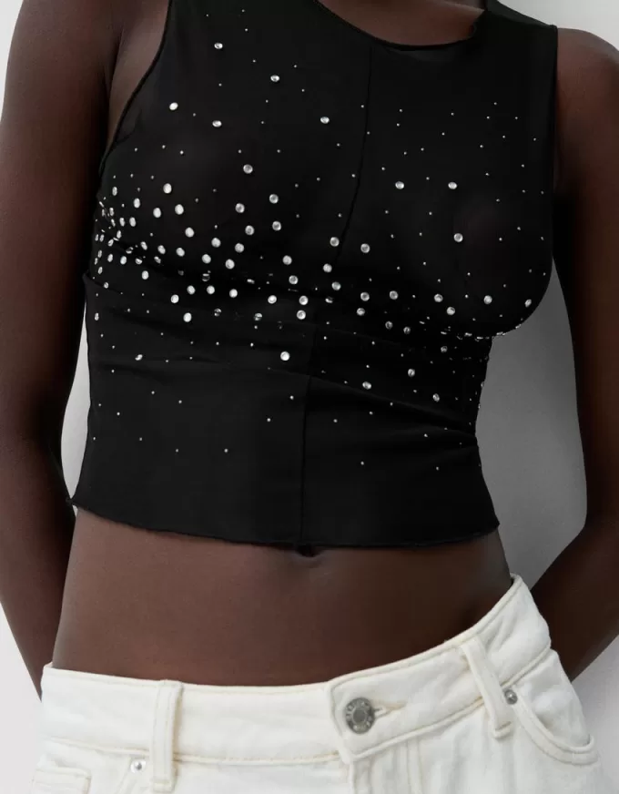 Ärmlös t-shirt i strass i tyll Ärmlös t-shirt i strass i tyll