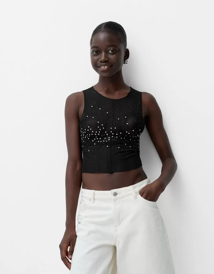 Ärmlös t-shirt i strass i tyll Ärmlös t-shirt i strass i tyll