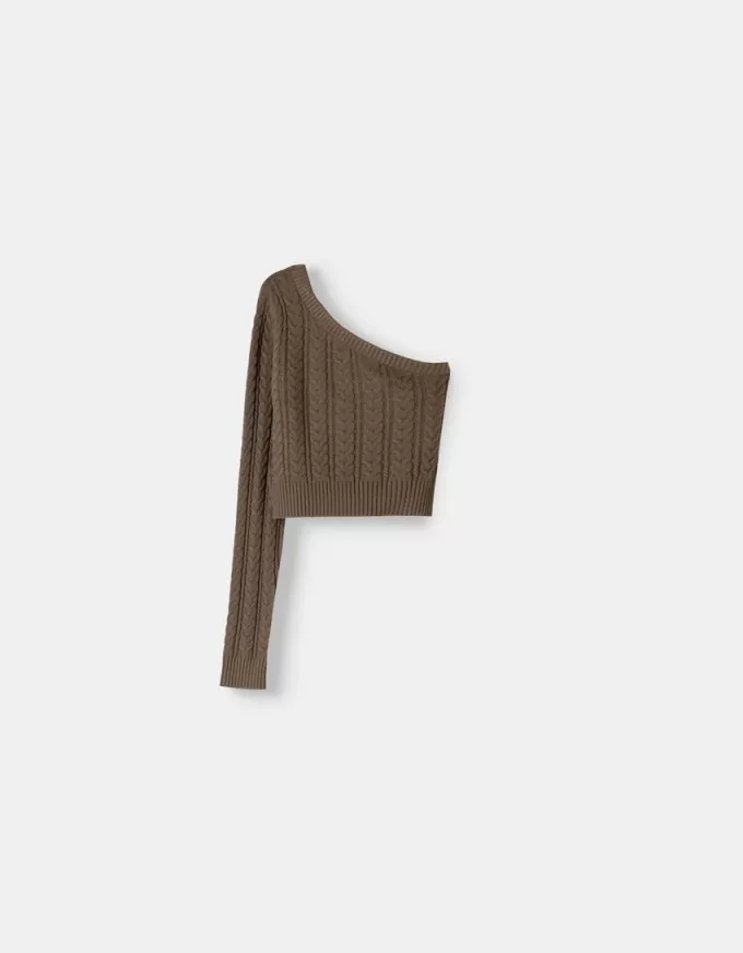 Asymmetrisk kabelstickad tröja Asymmetrisk kabelstickad tröja