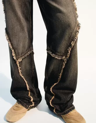Baggy jeans med fransar
