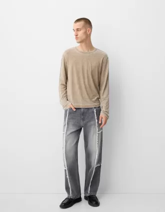 Baggy jeans med fransar