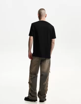 Baggy jeans med lappar