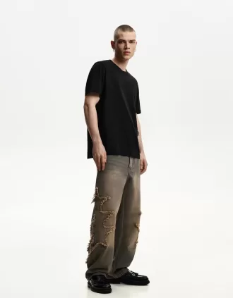 Baggy jeans med lappar