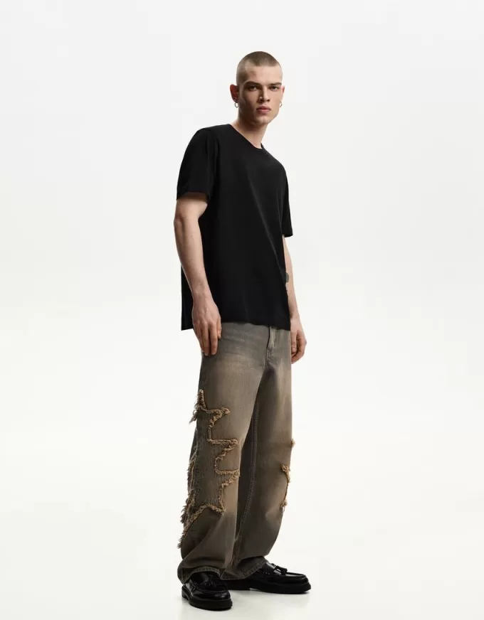 Baggy jeans med lappar Baggy jeans med lappar