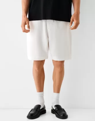 Bermudashorts med vida ben