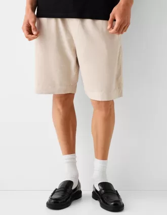 Bermudashorts med vida ben