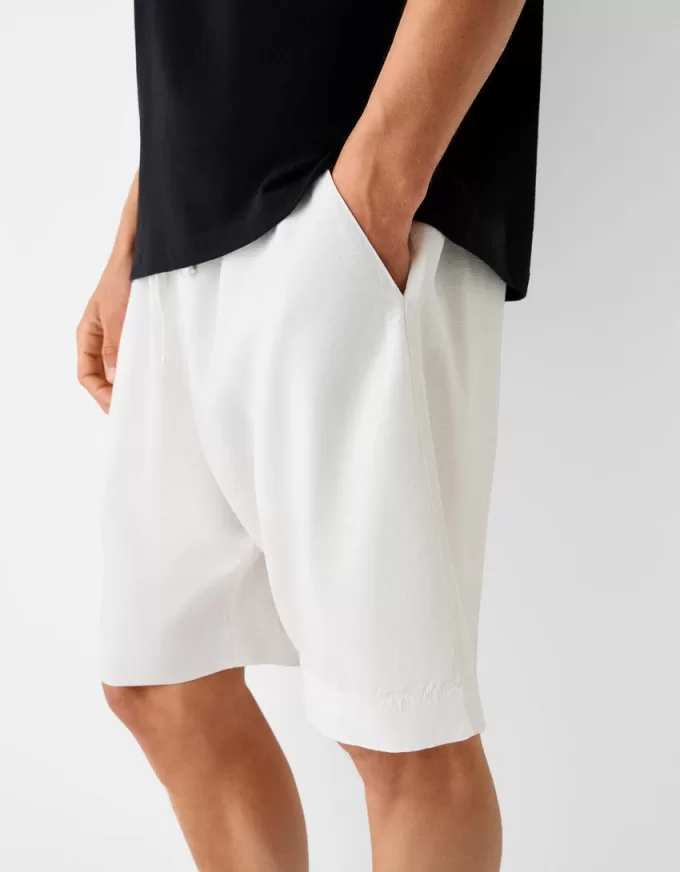 Bermudashorts med vida ben Bermudashorts med vida ben