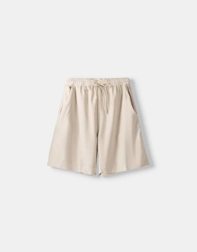 Bermudashorts med vida ben Bermudashorts med vida ben