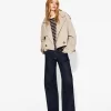 Beskuren trenchcoat