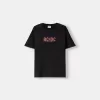 Blekt kortärmad T-shirt med AC/DC-tryck Blekt kortärmad T-shirt med AC/DC-tryck