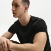 Broderad kortärmad upprullbar T-shirt