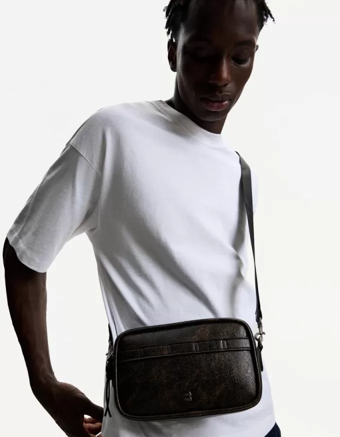 Distressed crossbody-väska Distressed crossbody-väska