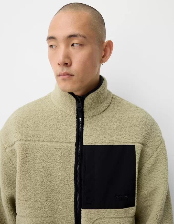 Faux shearling-jacka med kontrastdetaljer