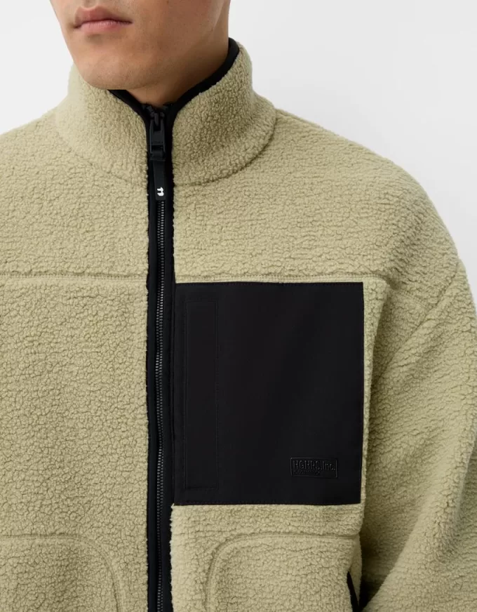 Faux shearling-jacka med kontrastdetaljer