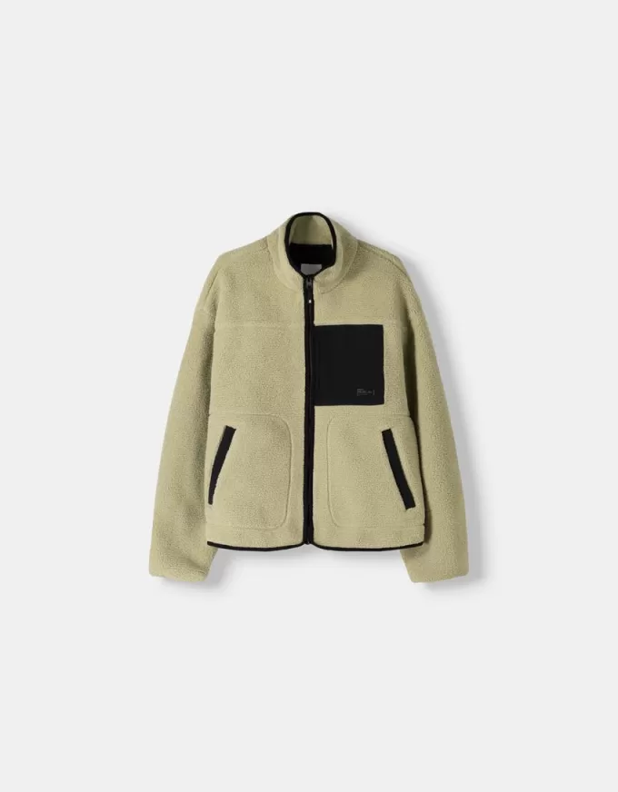 Faux shearling-jacka med kontrastdetaljer