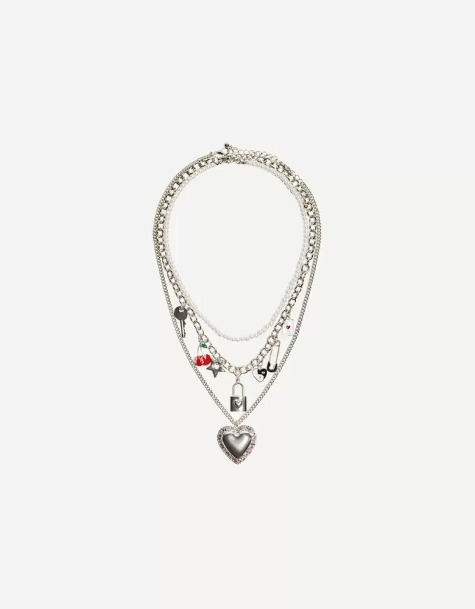 Förpackning med 3 hängande halsband Förpackning med 3 hängande halsband