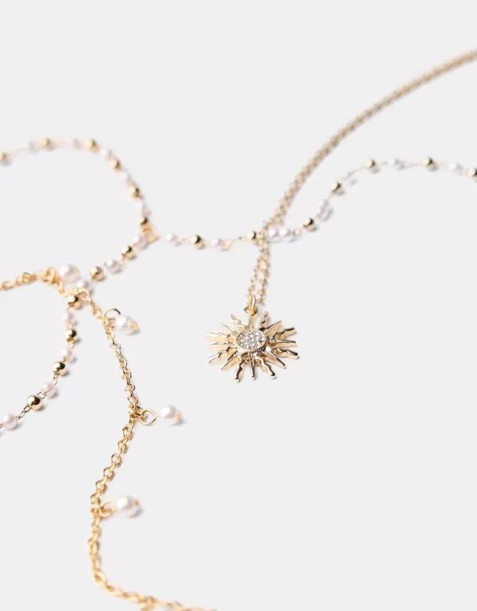 Förpackning med 3 hängande halsband Förpackning med 3 hängande halsband