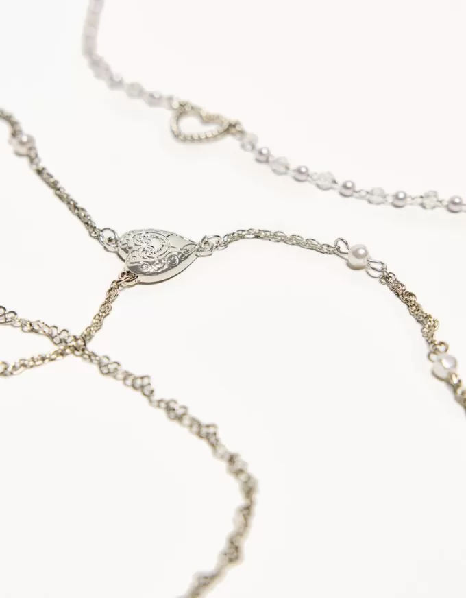 Förpackning med 3 hängande halsband Förpackning med 3 hängande halsband
