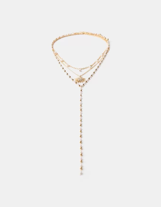 Förpackning med 3 hängande halsband Förpackning med 3 hängande halsband