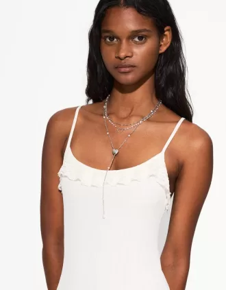 Förpackning med 3 hängande halsband