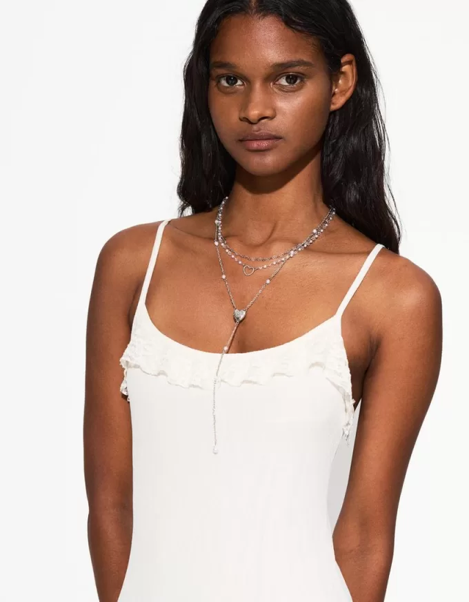 Förpackning med 3 hängande halsband Förpackning med 3 hängande halsband