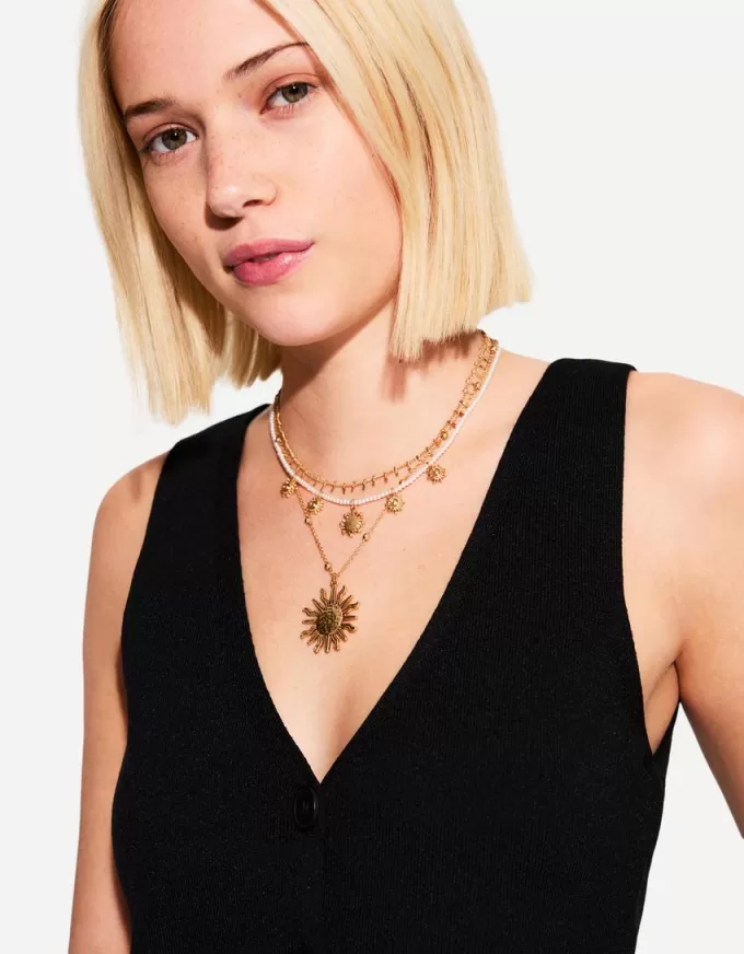 Förpackning med 3 hängande halsband Förpackning med 3 hängande halsband