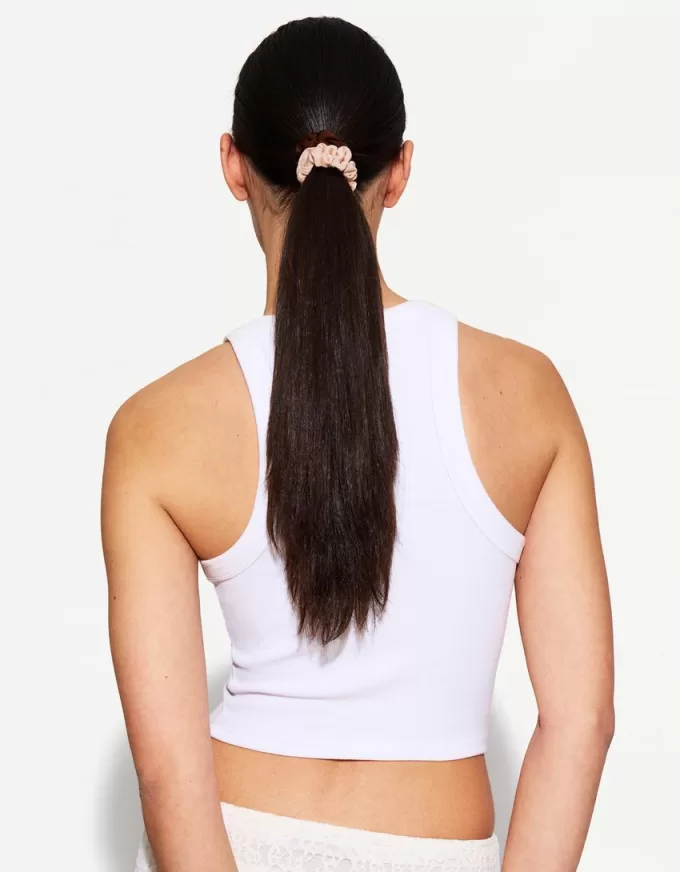Förpackning med 4 scrunchies Förpackning med 4 scrunchies