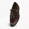 Fransade loafers med tofsar