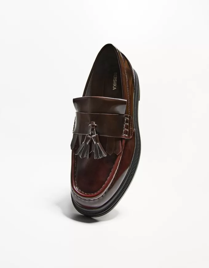 Fransade loafers med tofsar