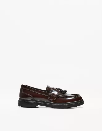 Fransade loafers med tofsar