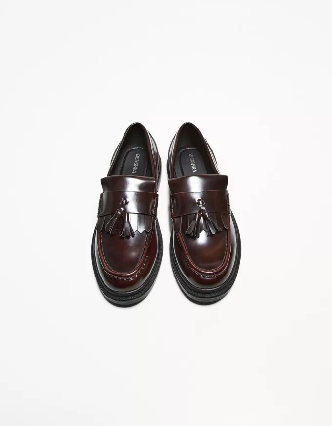 Fransade loafers med tofsar