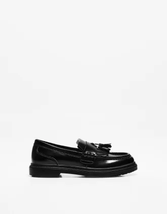 Fransade loafers med tofsar