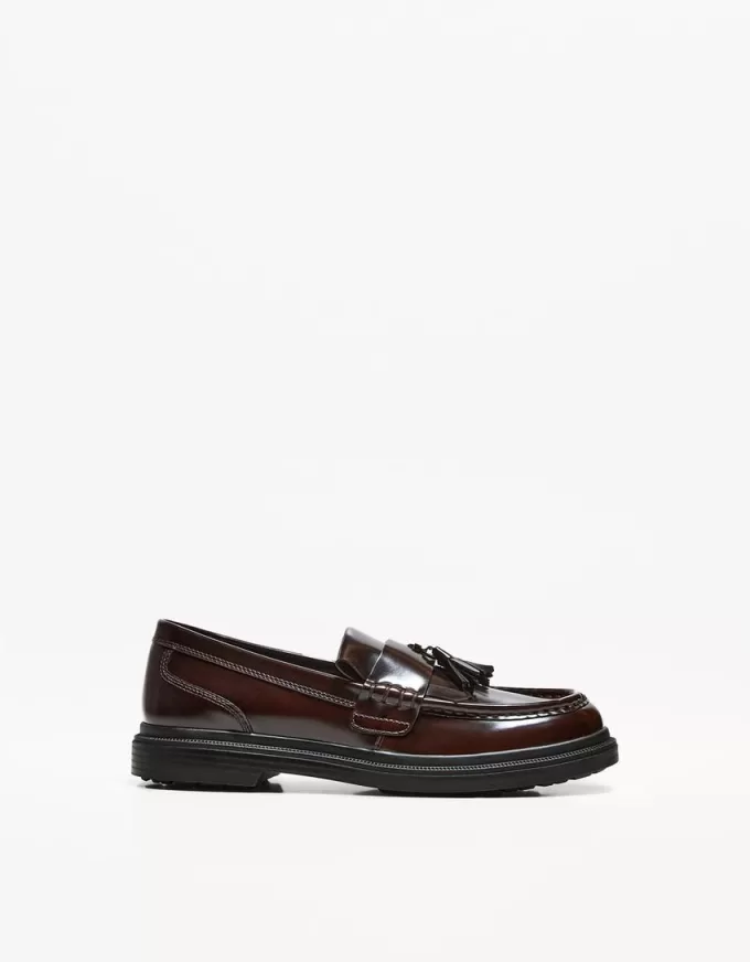 Fransade loafers med tofsar