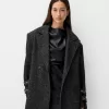 Generation Bershka kappa med öljetter Generation Bershka kappa med öljetter