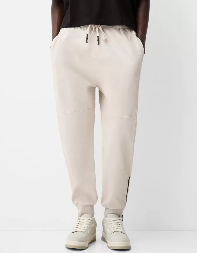 Joggingbyxor med dragkedjor Joggingbyxor med dragkedjor