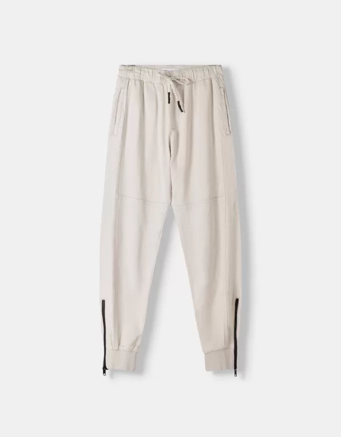 Joggingbyxor med dragkedjor Joggingbyxor med dragkedjor