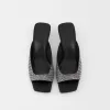 Klackade mulesandaler med strassdetaljer Klackade mulesandaler med strassdetaljer
