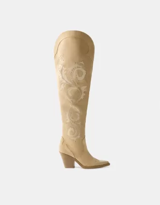 Knähöga cowboystövlar med hög klack
