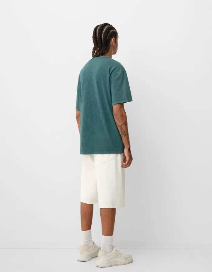 Kortärmad T-shirt med blekt effekt med tryck Kortärmad T-shirt med blekt effekt med tryck