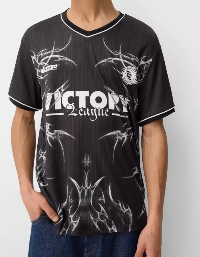 Kortärmad T-shirt med meshtryck Kortärmad T-shirt med meshtryck