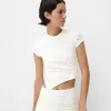 Kortärmad asymmetrisk T-shirt med nitar