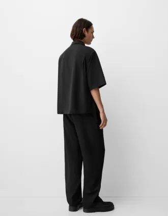 Kortärmad boxy fit korsad skjorta med spänne